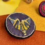 Broche papillon noir et jaune