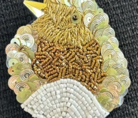broche oiseau dorée