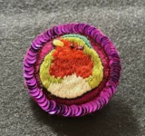 broche oiseau paillette rose