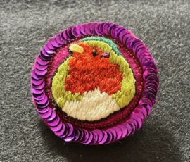 broche oiseau paillette rose